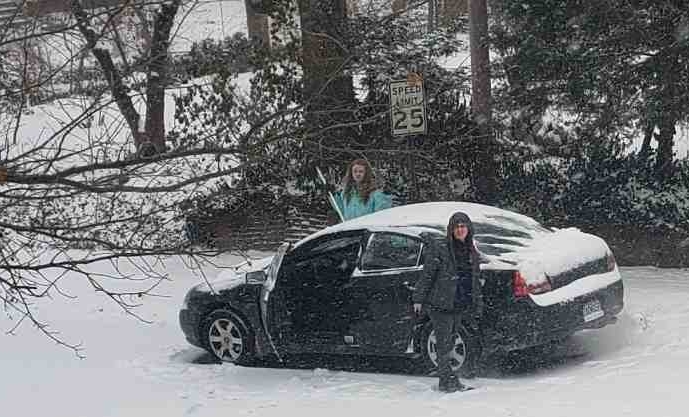 2021-02-15 Cleaning snow off Charles.jpg